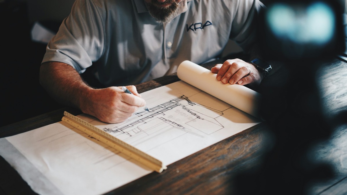 Engineer reviewing construction drawings